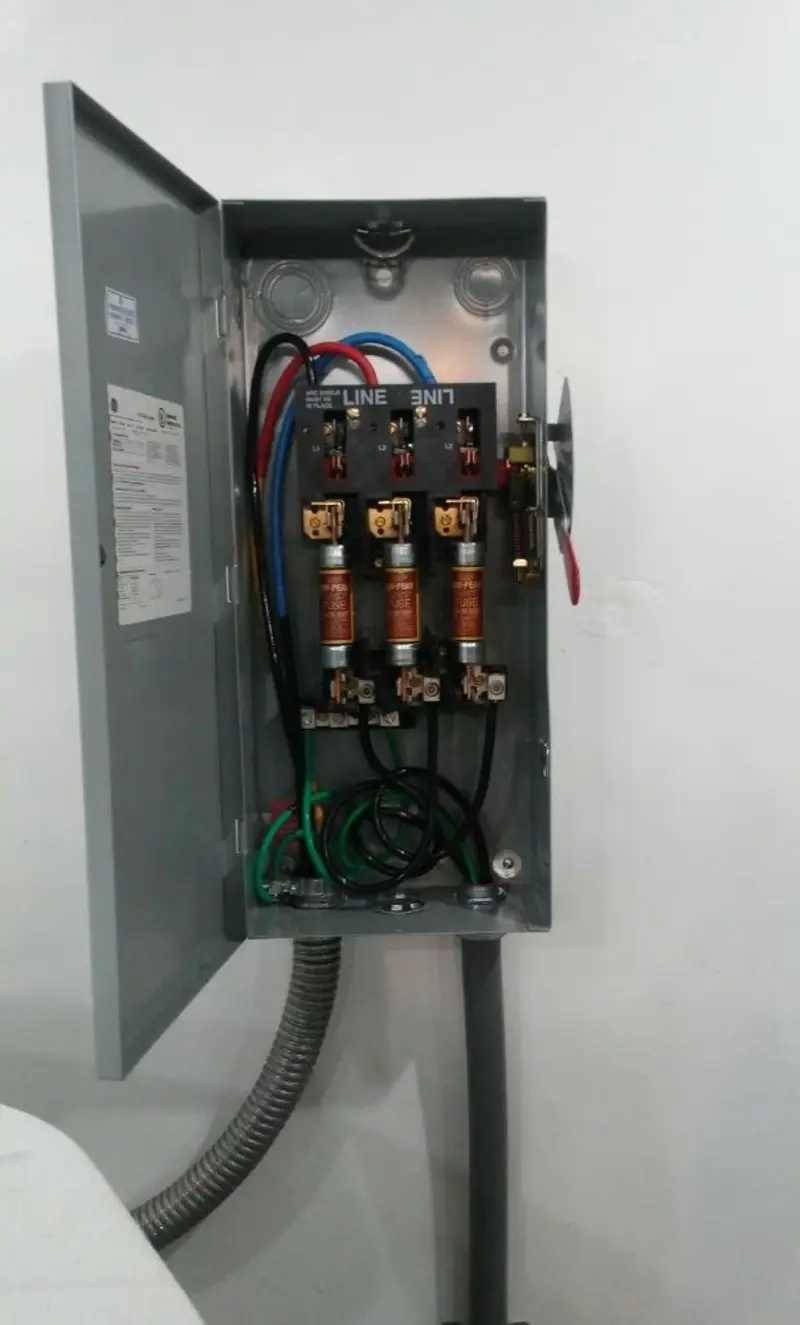 Three-phase disconnect switch installed for Smoke Detector Installation in Aston