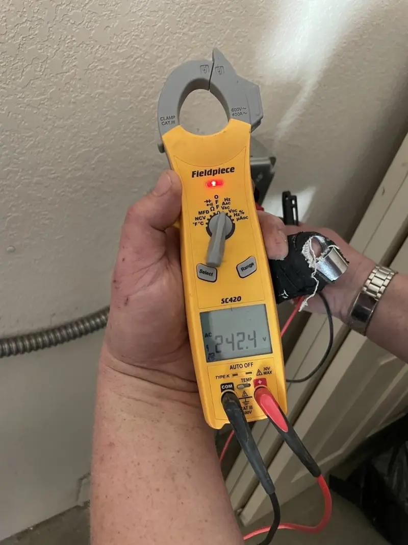 Voltage testing with clamp meter during Generator Installation in Aston